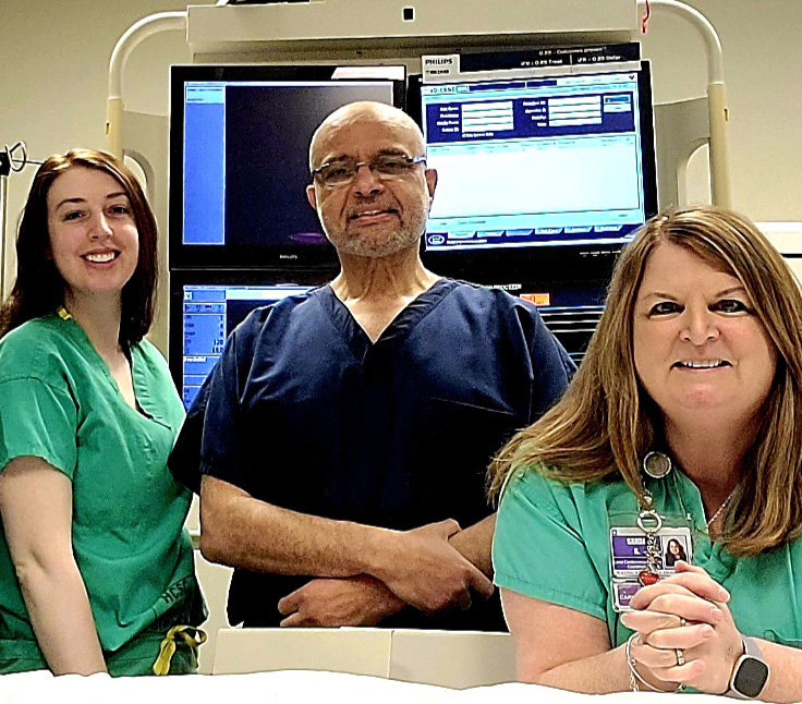 Caring for patients with chest pain. Pictured are Cassidy Cohen, left; Dr. Walid Hassan; and Sandi Skrobiszewski...